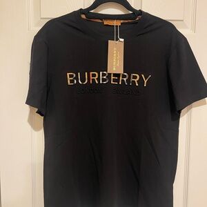 Burberry Ladies Black Tee with the Nova Check Lettering  NWT